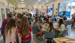 A crowd of party guests at the VE Day 80 celebrations.