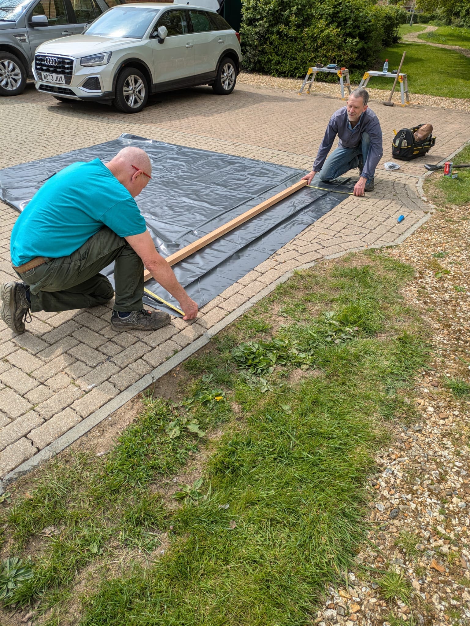 Measuring up for the raised flowerbeds Measuring up for the raised flowerbeds
