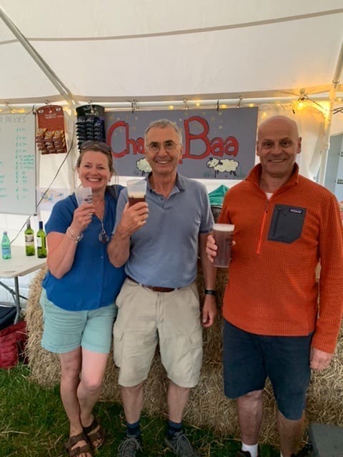 Volunteers raise a glass at the annual Stroud Revels